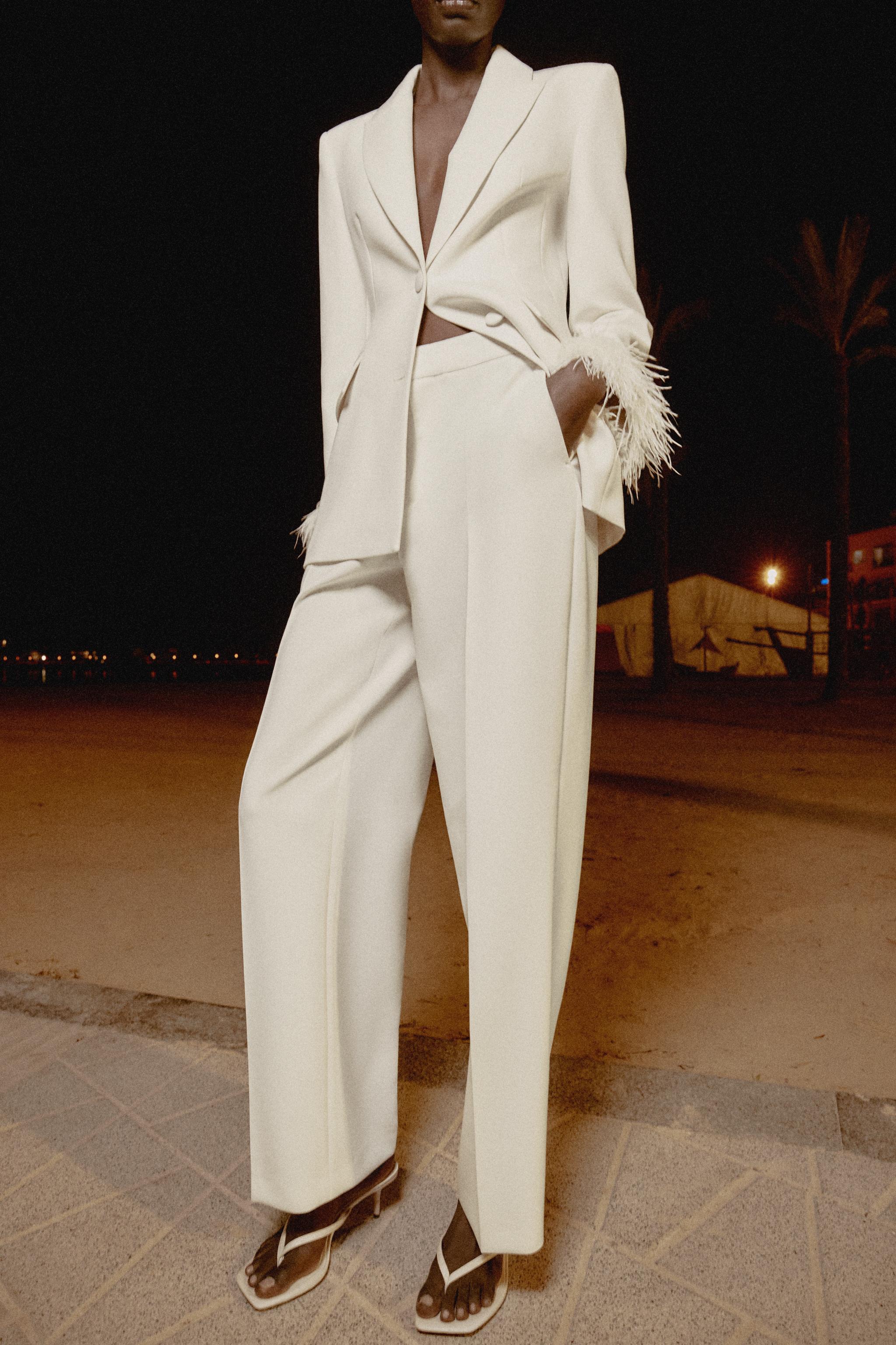 BLAZER WITH FEATHER CUFFS